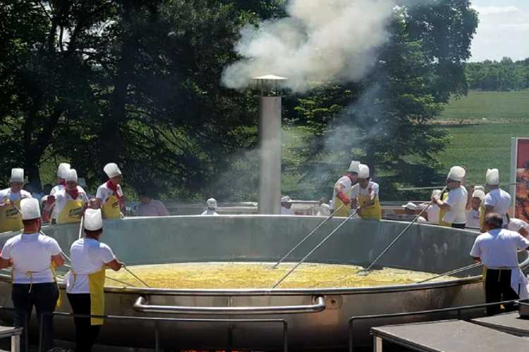 “Edirne Liver Festival giant frying pan with multiple chefs cooking simultaneously”