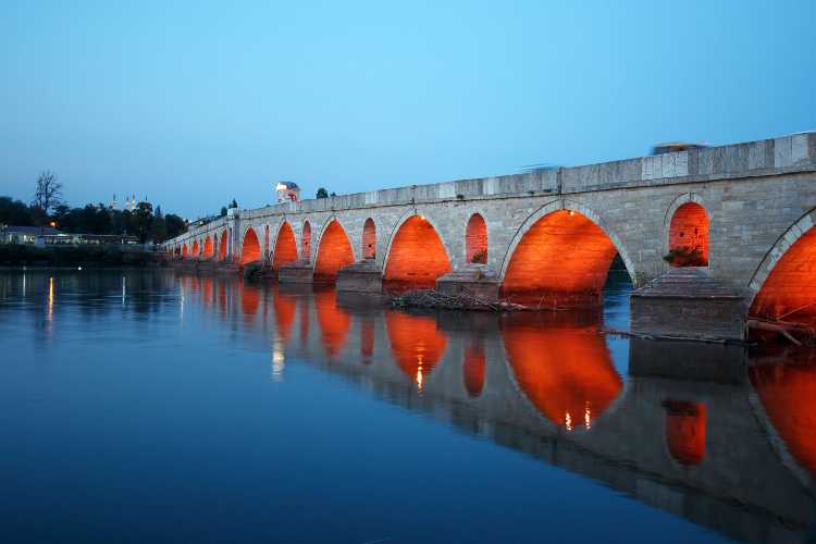 Mecidiye (Meriç) Bridge in Edirne, viewed from sea level with arches illuminated
