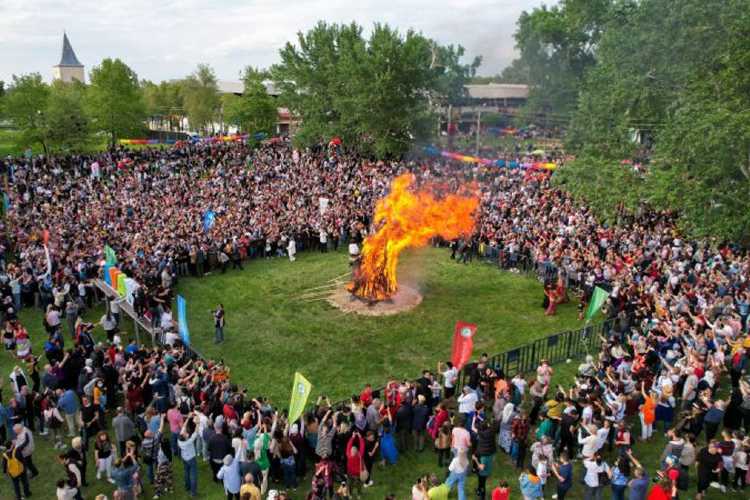 People dancing around the Kakava bonfire during the annual spring festival in Edirne