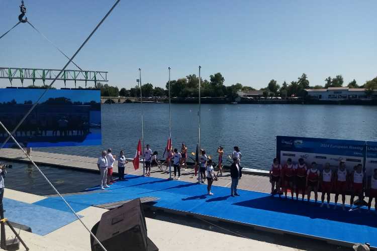 Rowing athletes during a medal ceremony following a race on the Meriç River in Edirne
