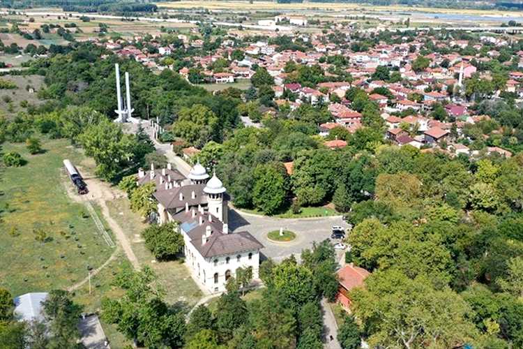 "view of Trakya University Karaağaç Campus in Edirne, showing the historic train station, surrounding trees, and campus buildings. (Photo: AA)