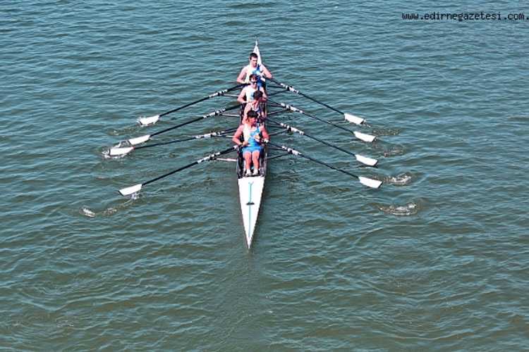 A rowing crew competing on the Meriç River in Edirne during an international rowing event