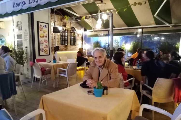 People sitting inside a café in Fatih Neighborhood, Edirne, having drinks and conversations at indoor tables