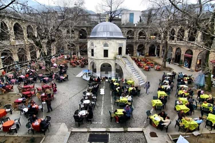 “Historic Koza Han in Bursa, Turkey – traditional Ottoman silk bazaar and courtyard”