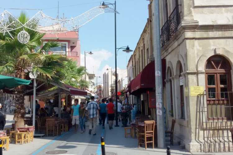 “Downtown Çanakkale with authentic historic buildings and people walking”