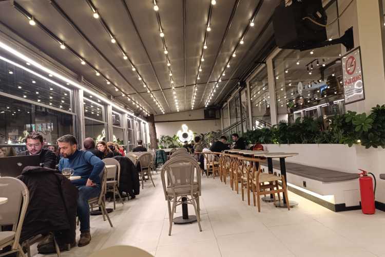 Interior of The Coffee Factory café in Edirne, showing people sitting and drinking coffee