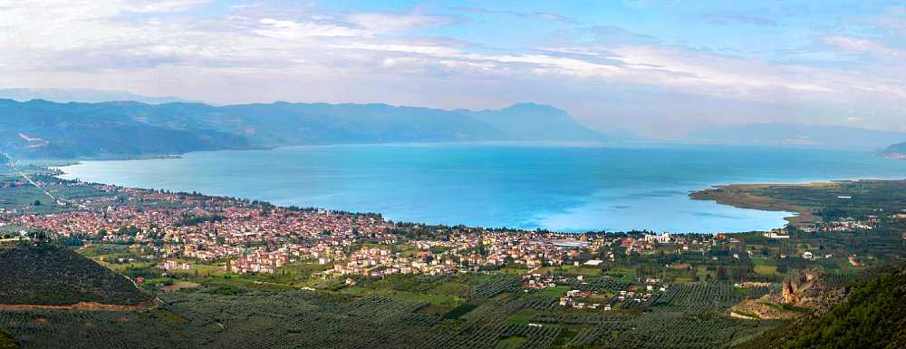Aerial view of İznik town and Lake İznik in Bursa, Turkey, showing the historic lakeside settlement surrounded by natural landscape.