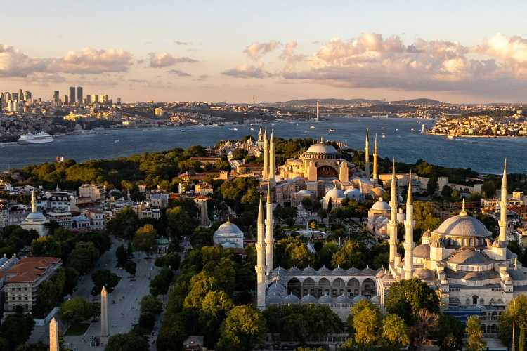 Birds-eye view of Istanbul skyline with Blue Mosque and Hagia Sophia in the foreground and the Bosphorus in the background