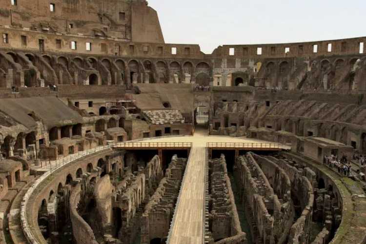Interior of the Colosseum in Rome showing ancient arches and arena structure