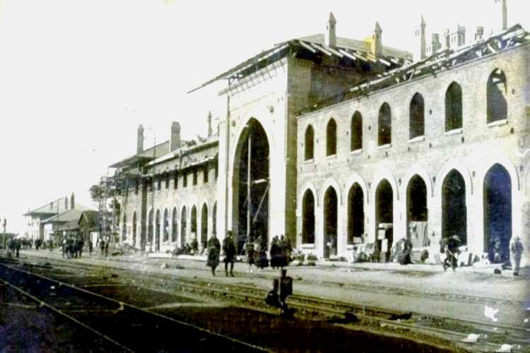 Nostalgic historic train carriage with people walking in front, Edirne railway setting