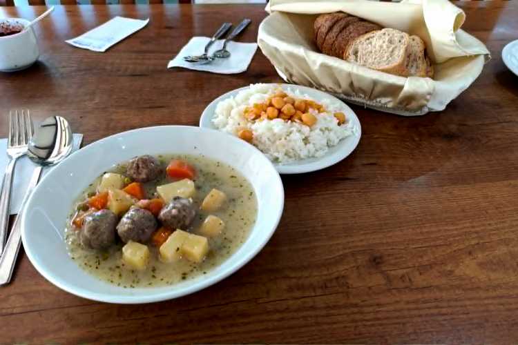 Traditional Turkish sulu köfte, rice and beans served on a table at Ustam Restaurant in Edirne
