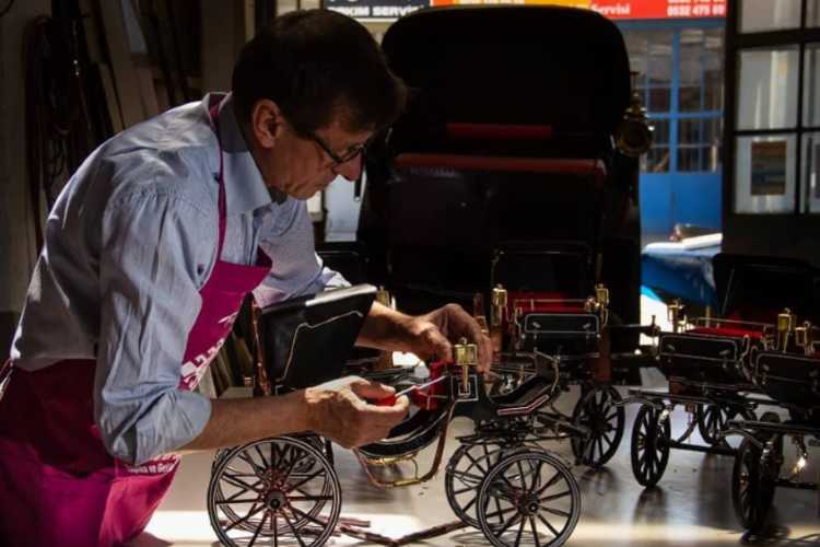 Özcan Abacı working on a traditional small scale talika miniature in his workshop in Edirne, Turkey