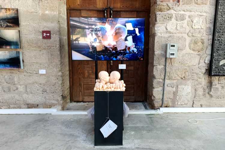 AI-generated artwork on display at Ekmekçizade Ahmet Paşa Kervansaray during Edirne Bienali 2026