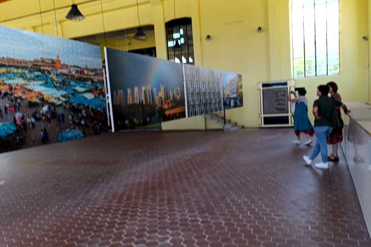 Ayten and Semra viewing contemporary artwork inside Edirne’s historic Old Electricity Building