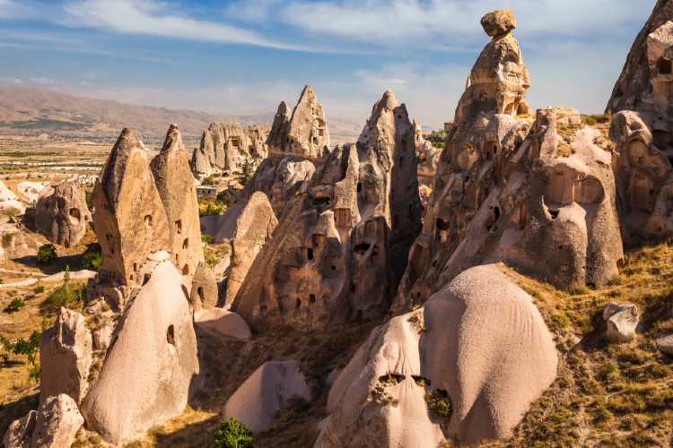 Cappadocia landscape with ancient rock formations and historic cave settlements in Turkey